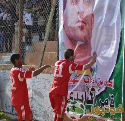 صورة قبلة وفا على جبين الشهيد العايدي